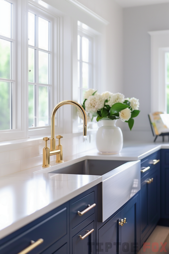 navy blue cabinets gold faucet stainless steel sink