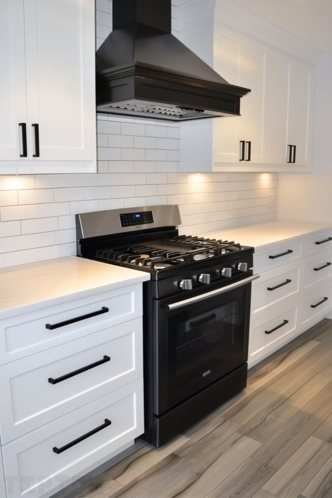 subway tile backsplash white kitchen black handles wood floor